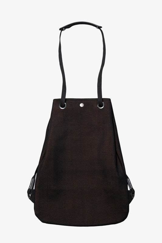 Front view of a black knitted Apple Picker backpack with black strap