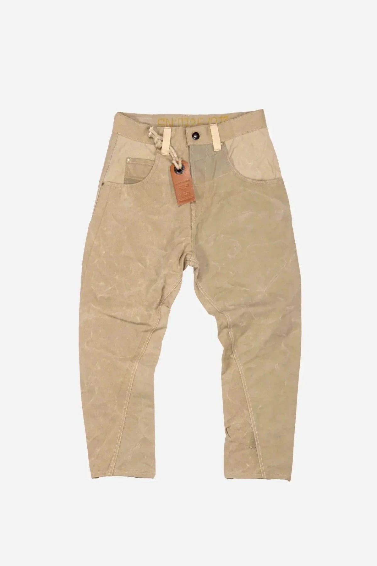 Front view of light brown army carrot pants on a white background