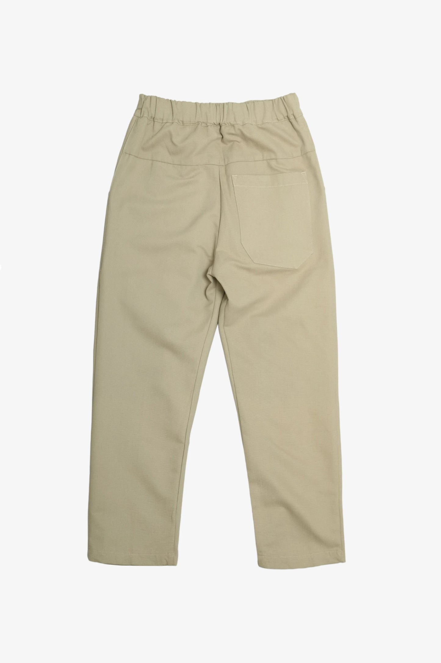 Beige relaxed fit pants with an elastic waistband and a single back pocket, showcasing a casual yet structured style ideal for versatile menswear.