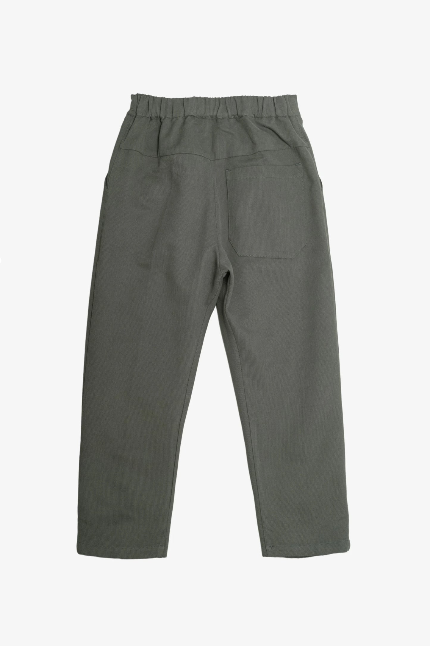 Relaxed fit men's pants in muted olive green with an elastic waistband and a single back pocket, reflecting a military-inspired utility style.
